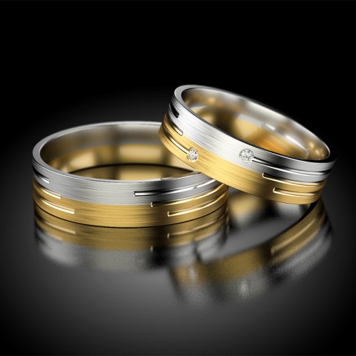 Obrączki z żółtego i białego złota cyrkonie Stelmach Moments