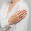 Pozłacany spiralny pierścionek z dwiema błyszczącymi czerwonymi cyrkoniami JP059-925-CZ marko