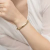 Złota sztywna bransoletka bangle segmentowa Sego B372-585 marko