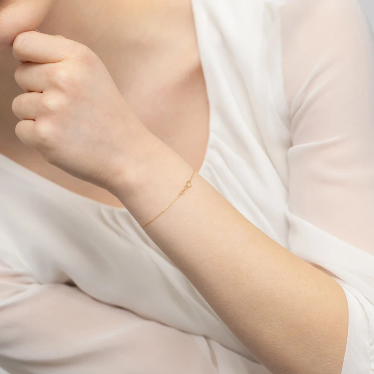 Złota delikatna bransoletka symbol nieskończoności spleciony z serduszkiem Jeso B-GW-335-585 marko