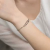 Srebrna bransoletka szeroki łańcuszek ankier paperclip czarne cyrkonie Kleur  B1107-925-CZS marko