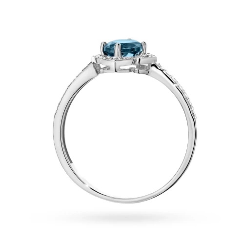 Złoty pierścionek zaręczynowy kwiatek  Topaz London Blue 0,50ct i brylanty białe złoto Kultowa