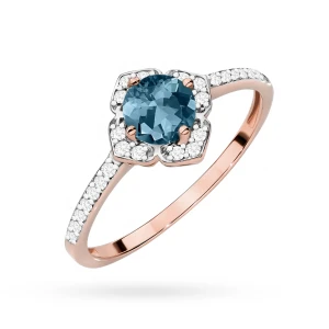 Złoty pierścionek zaręczynowy kwiatek  Topaz London Blue 0,50ct i brylanty różowe złoto Kultowa