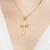 Pozłacany krzyż z Jezusem diamentowany zdobiony D367-925-Z marko