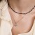 Złoty naszyjnik choker czarne koraliki złote kulki Kleur N412-585 marko