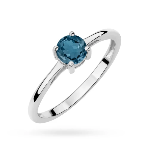 Złoty pierścionek z dużym topazem London  Blue 0,50ct z białego złota Kultowa