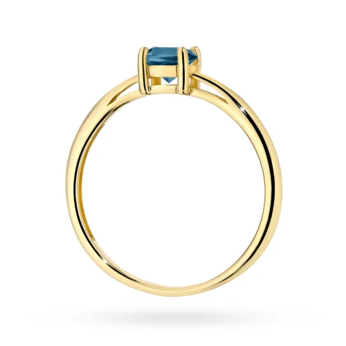 Złoty pierścionek z dużym topazem London  Blue 0,50ct z żółte złoto Kultowa