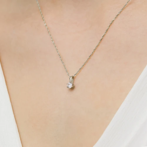 Klasyczna złota zawieszka z diamentem  0,30ct białe złoto