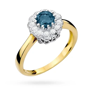 Złoty pierścionek zaręczynowy z topazem London Blue 0,50ct i brylantami Dynastia