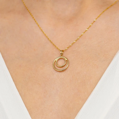 Złota zawieszka zdobiona diamentowaniem   koła okręgi Jeso