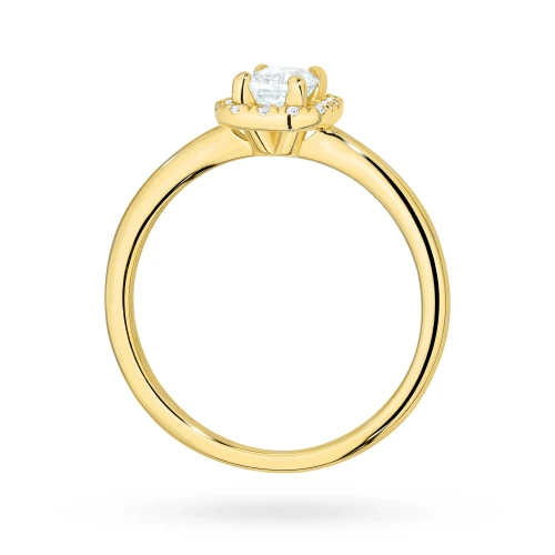 Pierścionek z żółtego złota z diamentem  0,50ct w szlifie emerald w oprawie halo