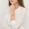 Srebrna bransoletka paciorki czarne koraliki krzyżyk Kleur B550-925-CZS modelka