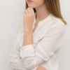 Złota bransoletka na łańcuszku biała cyrkonia skrzydełko Supreni B112-585 modelka